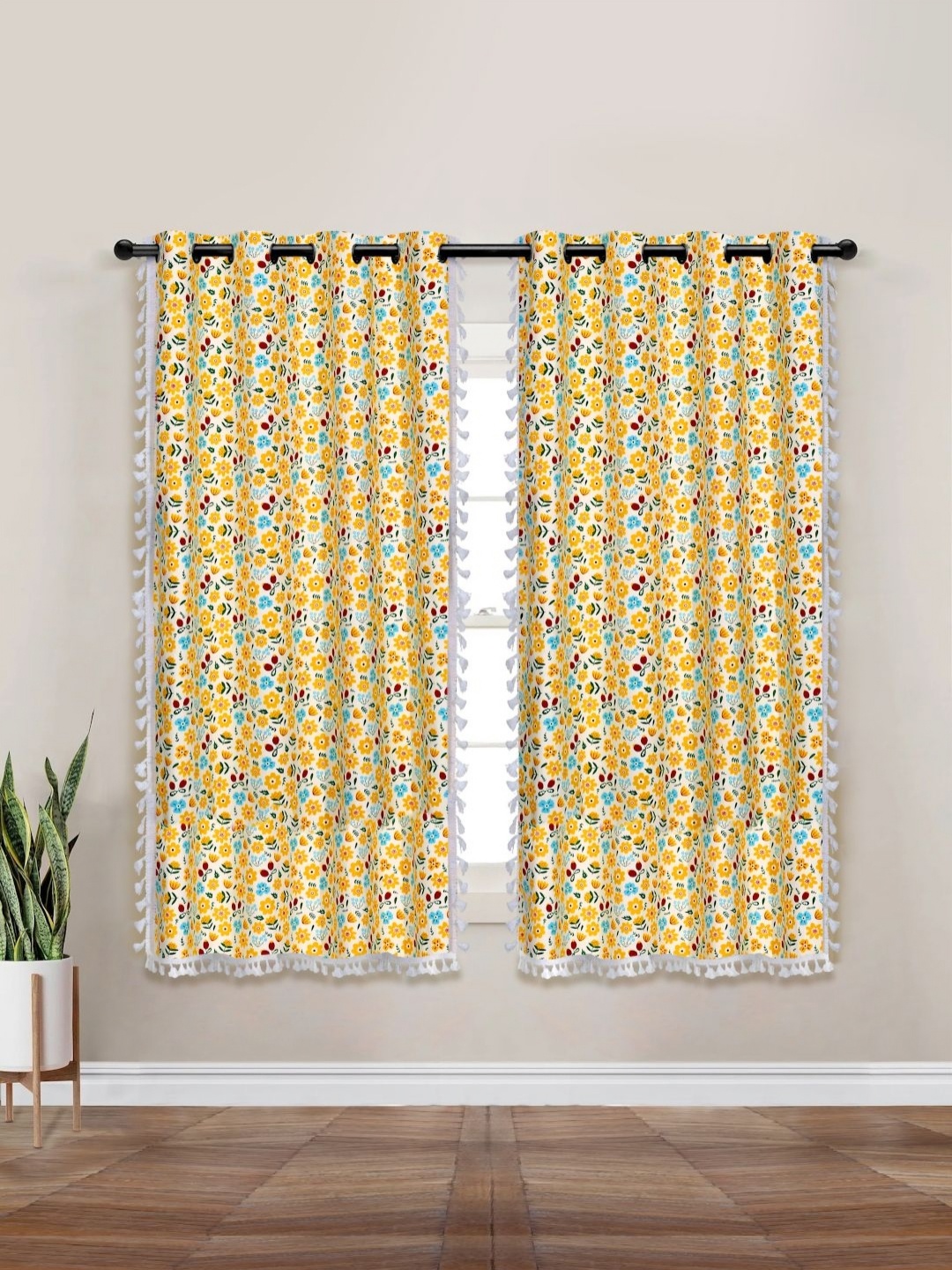 

Myntra Elegant Homes Yellow & White Set of 2 Floral Black Out Window Curtain