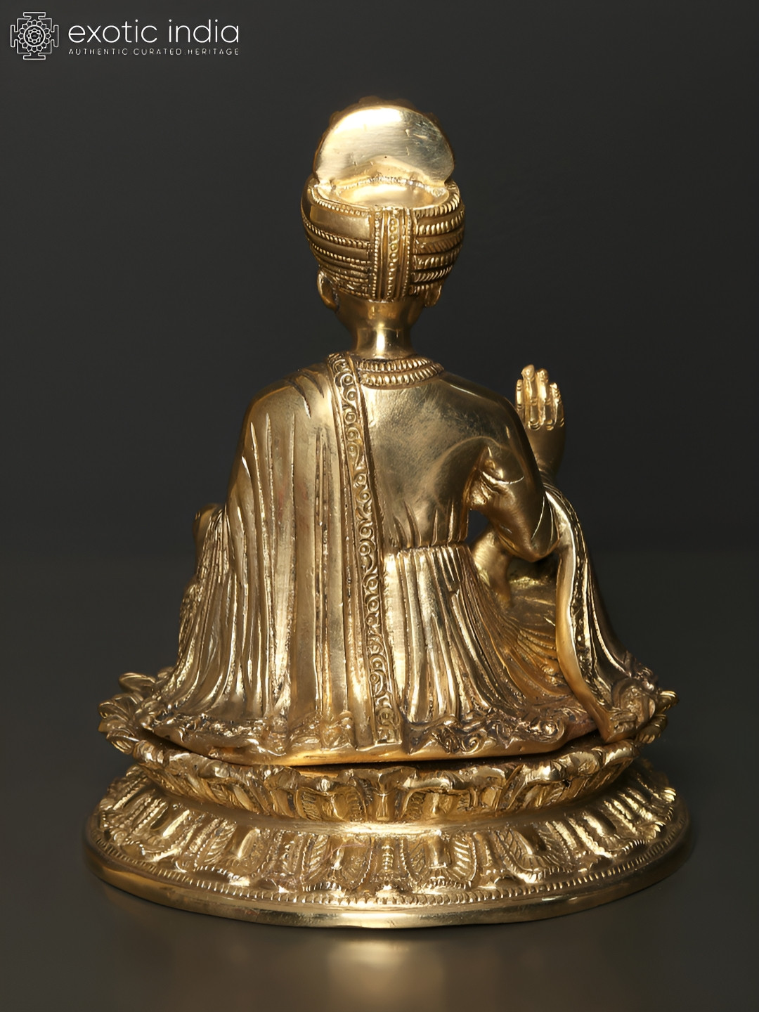 

Exotic India Beige Religious Idol Showpiece