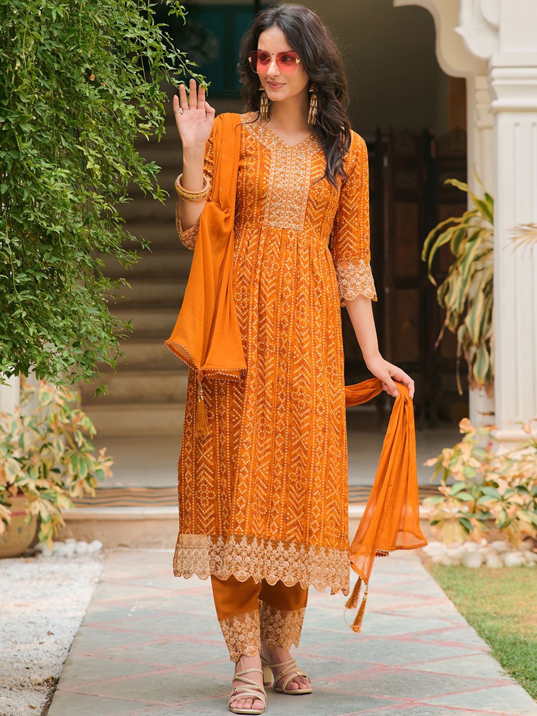 

Berrylicious Bandhani Embroidered Sequinned Straight Kurta With Trousers & Dupatta, Mustard