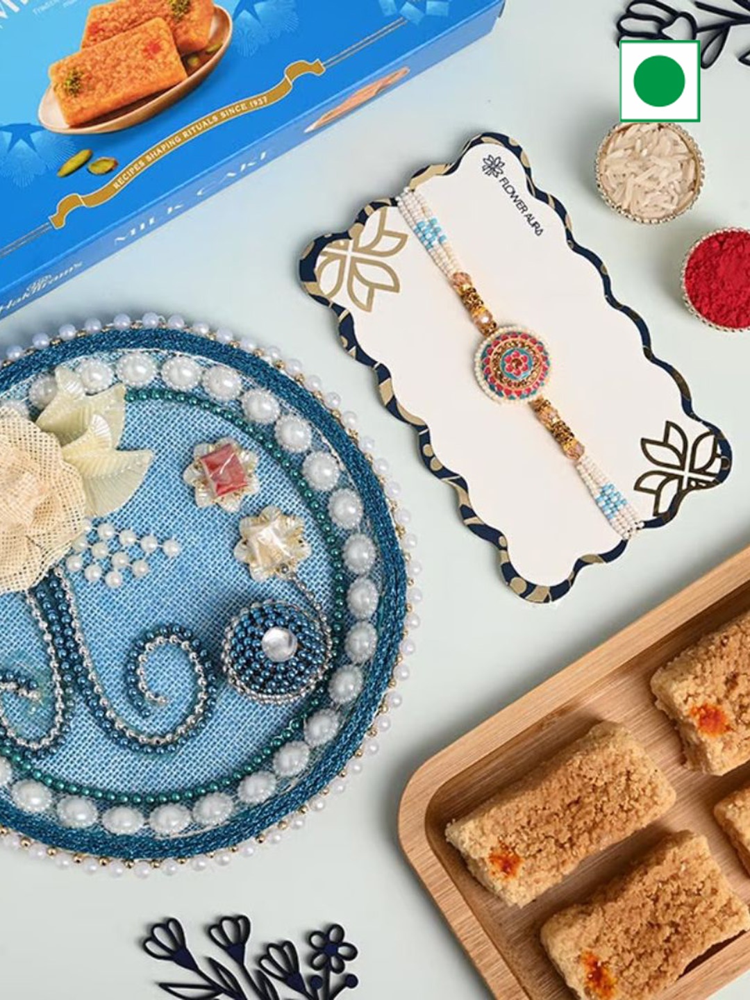 

Floweraura 1-Pc Rakhi With Milk Cake & Tika Thali, Blue