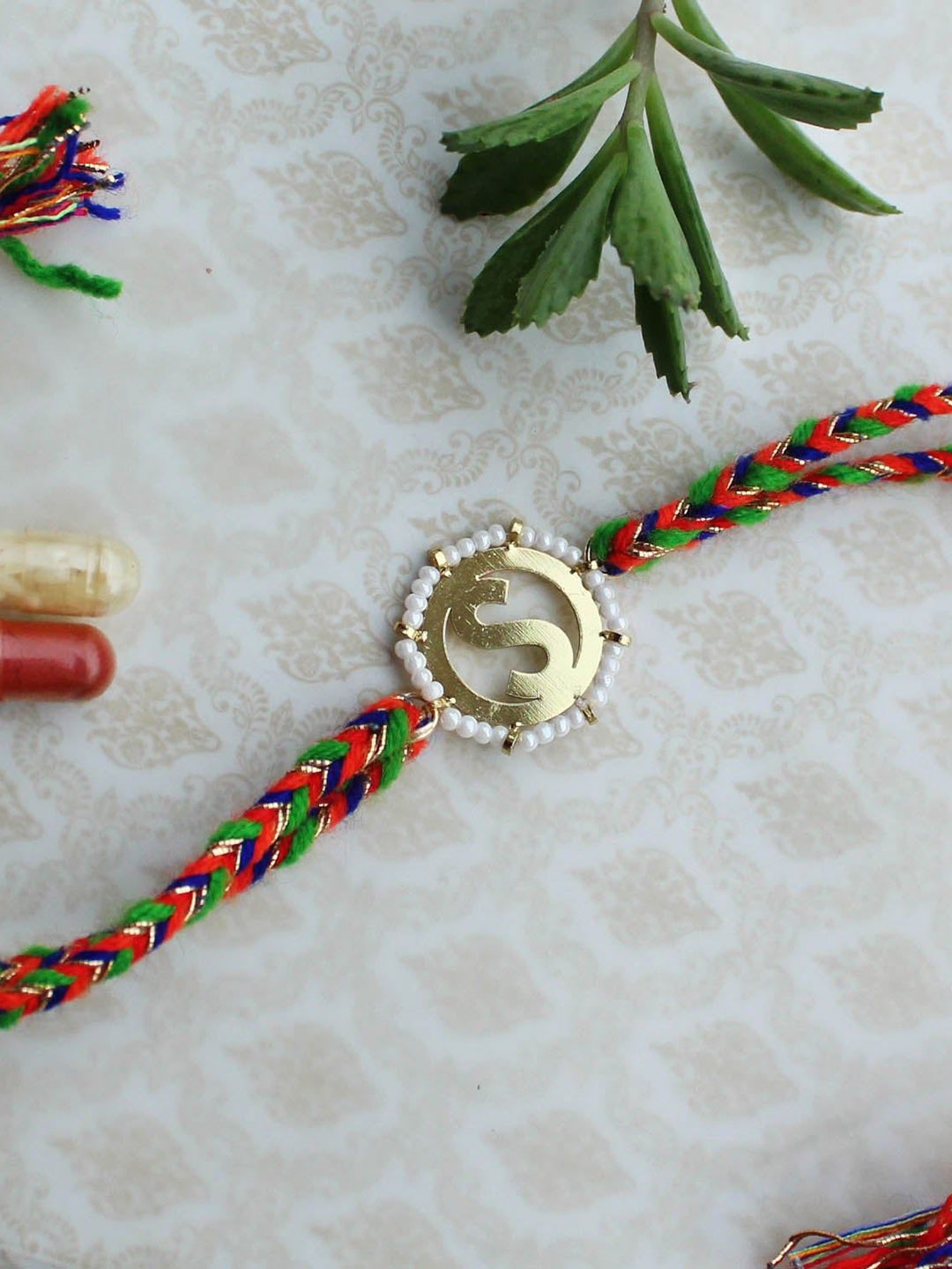 

BeAbhika O Initial Beaded Thread Rakhi With Roli Chawal, Gold