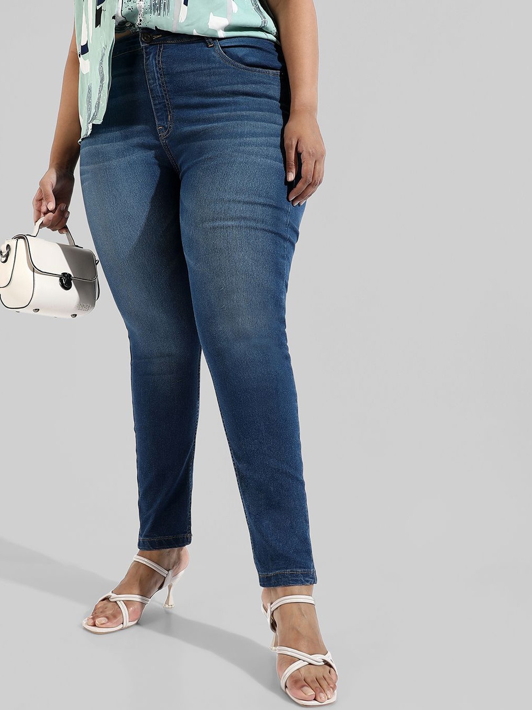 

Instafab Plus Women Comfort Relaxed Fit Light Fade Stretchable Plus Size Jeans, Blue