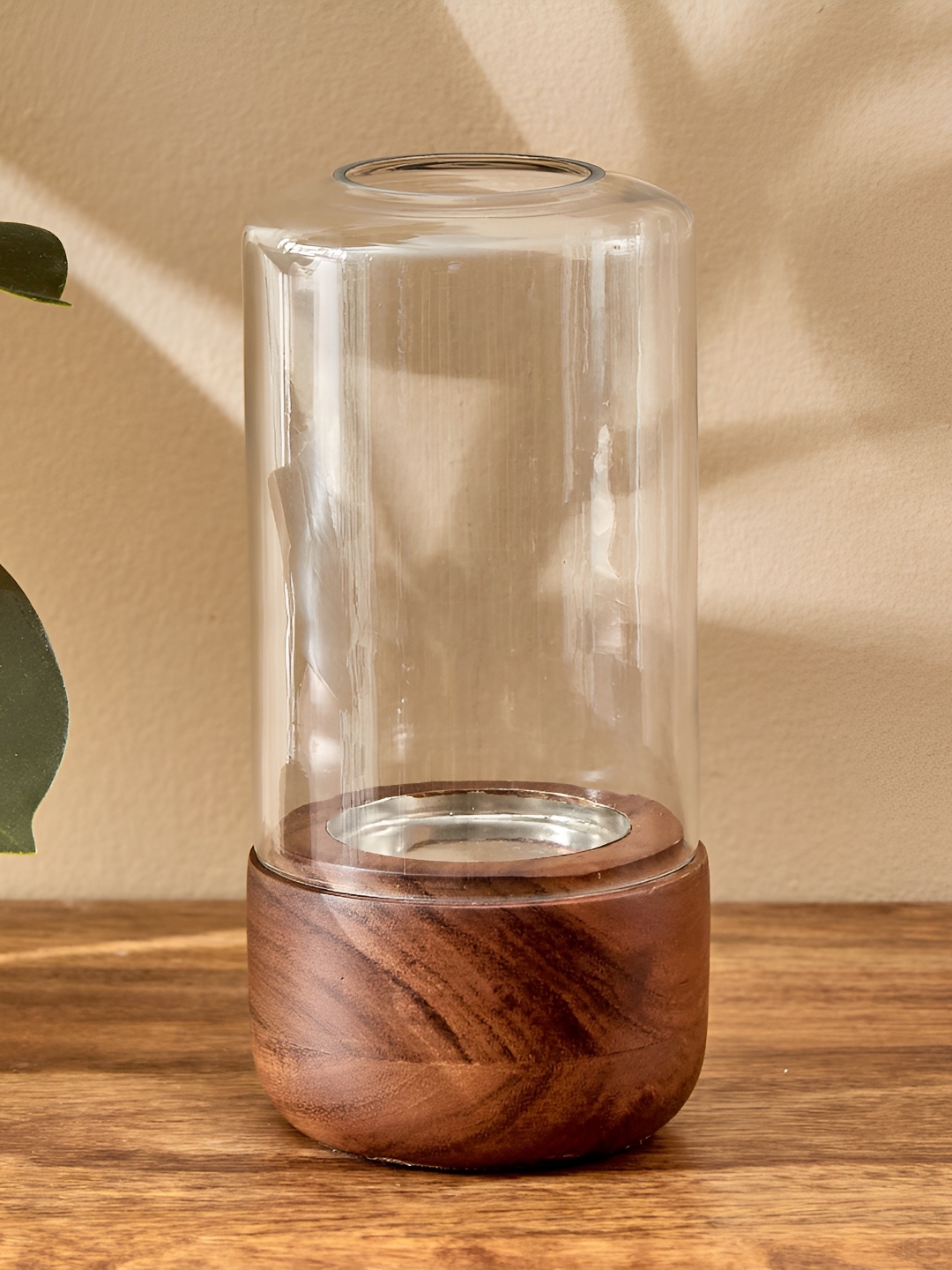 

Home Centre Brown Glass Candle Holder