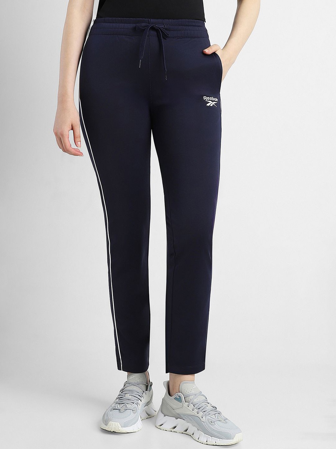 

Reebok ID BV Tricot Women Slim Fit Mid-Rise Track Pants, Navy blue
