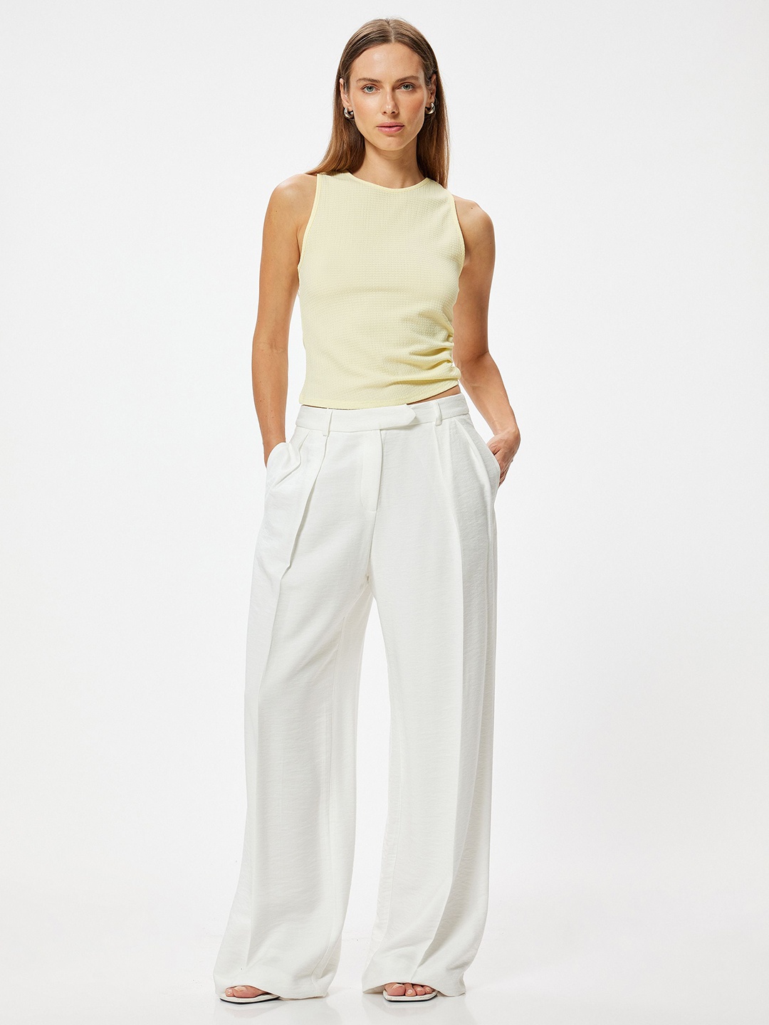 

Koton Women Solid Round Neck Polyester Top, Yellow