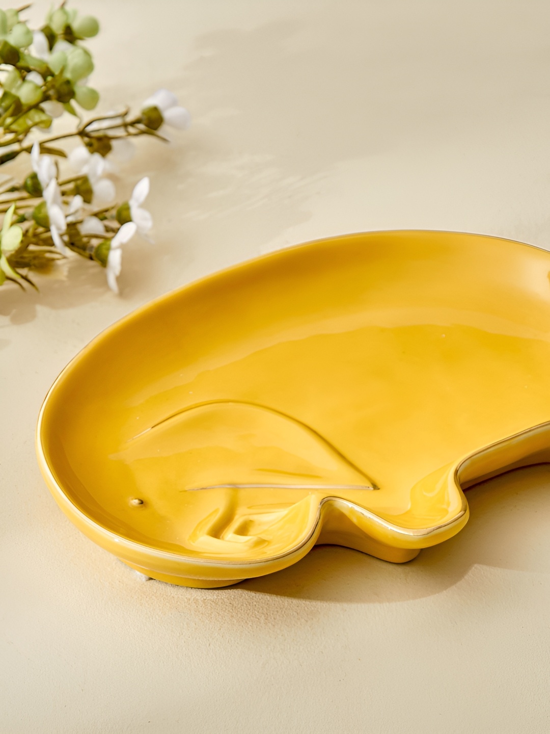 

Home Centre Yellow Ceramic Decorative Platter