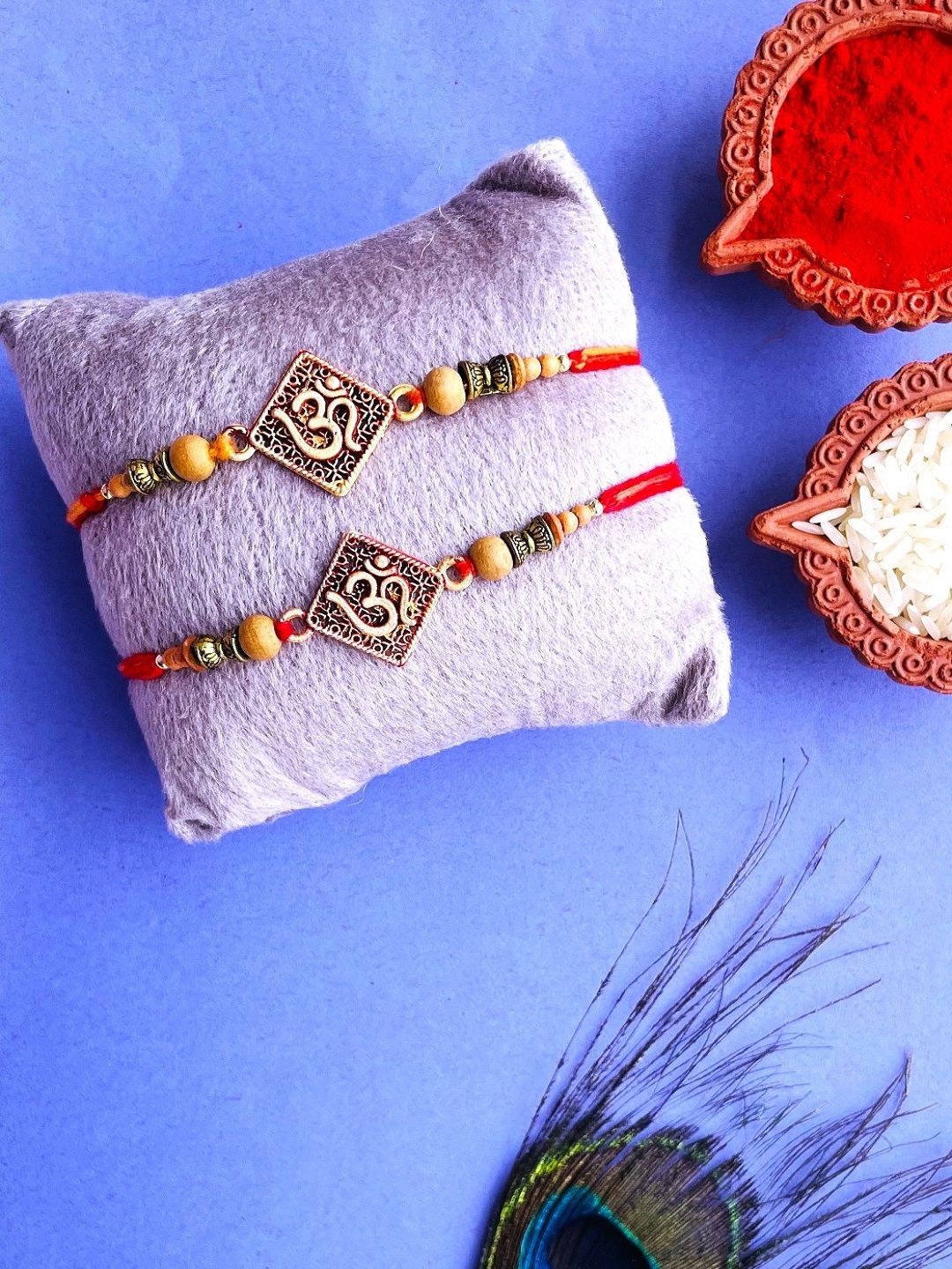 

Crunchy Fashion Set Of 2 Om Beaded Oxidized Thread Rakhis With Roli Chawal & Greeting Card, Brown