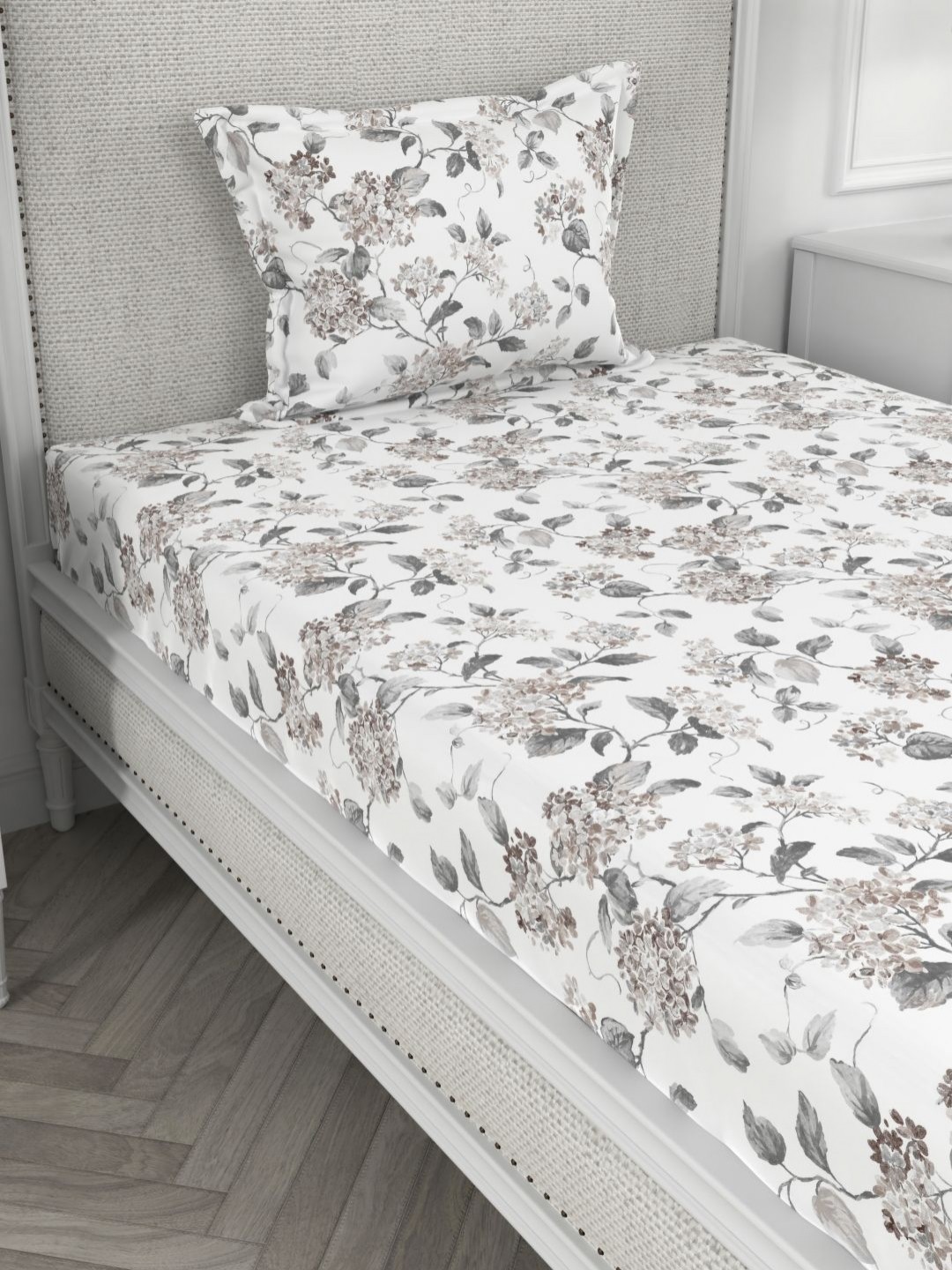 

Myntra Elegant Homes Grey & White Floral 200 TC Single Bedsheet with 1 Pillow Covers
