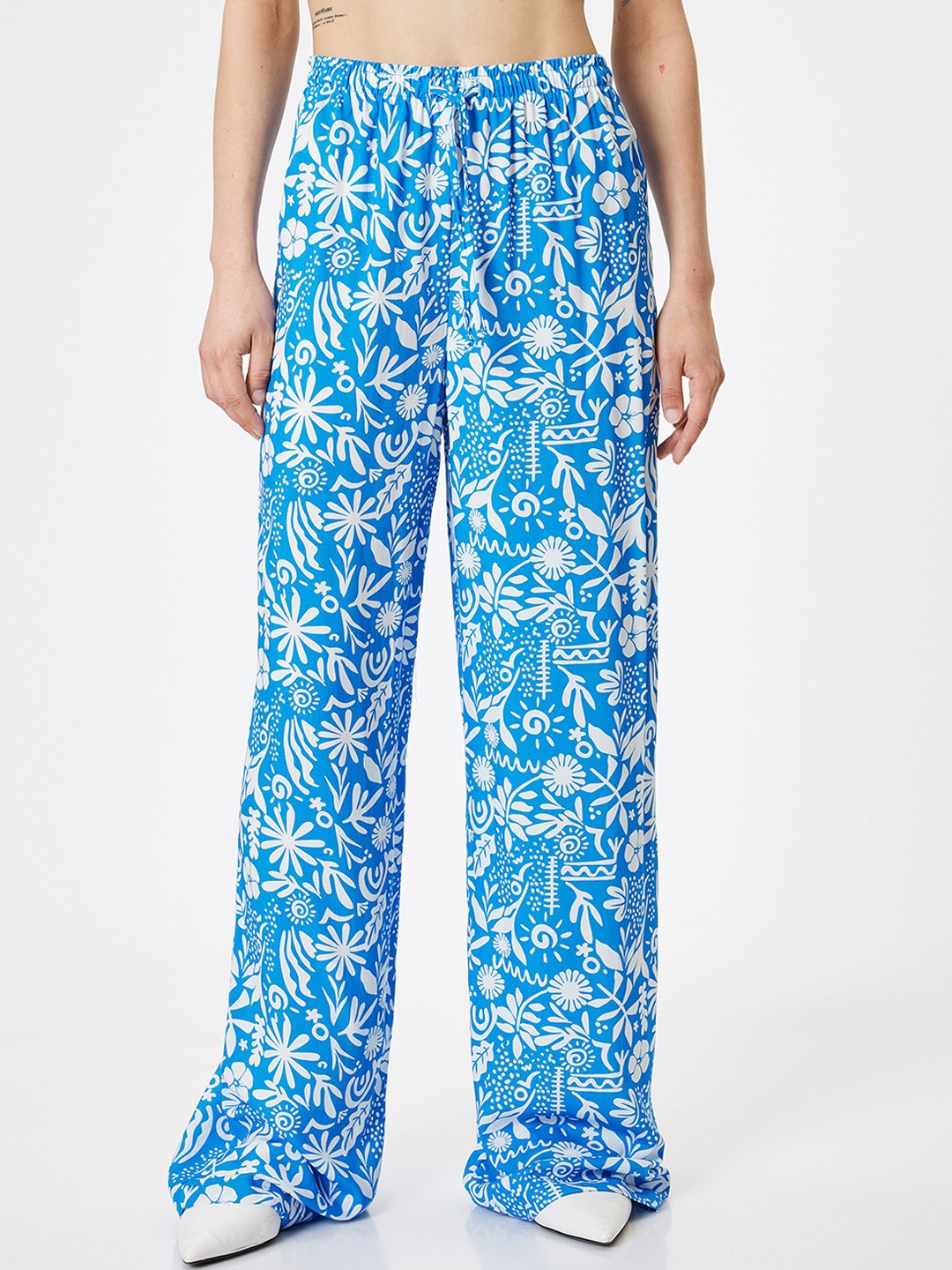 

Koton Women Printed Mid-Rise Loose Fit Wide Leg Trousers, Blue