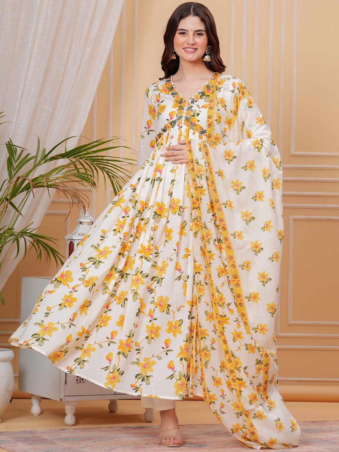 

Mizaz Floral Printed Sequinned Cotton Empire Style Anarkali Kurta With Trousers & Dupatta, Mustard