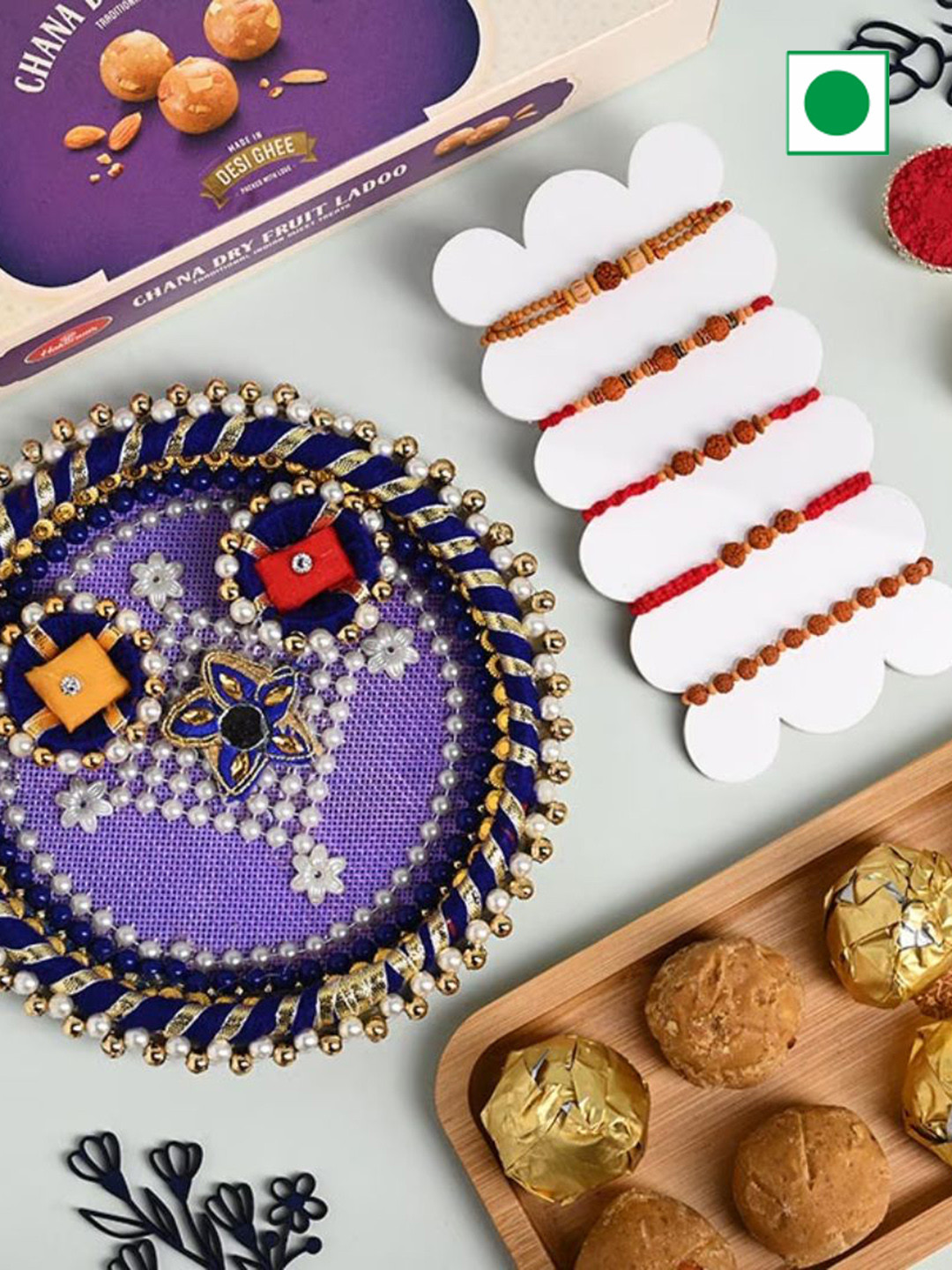 

Floweraura 5-Pcs Rakhi & Designer Engraved Thali With Chana Dry Fruit Laddoo Gift Set, Brown