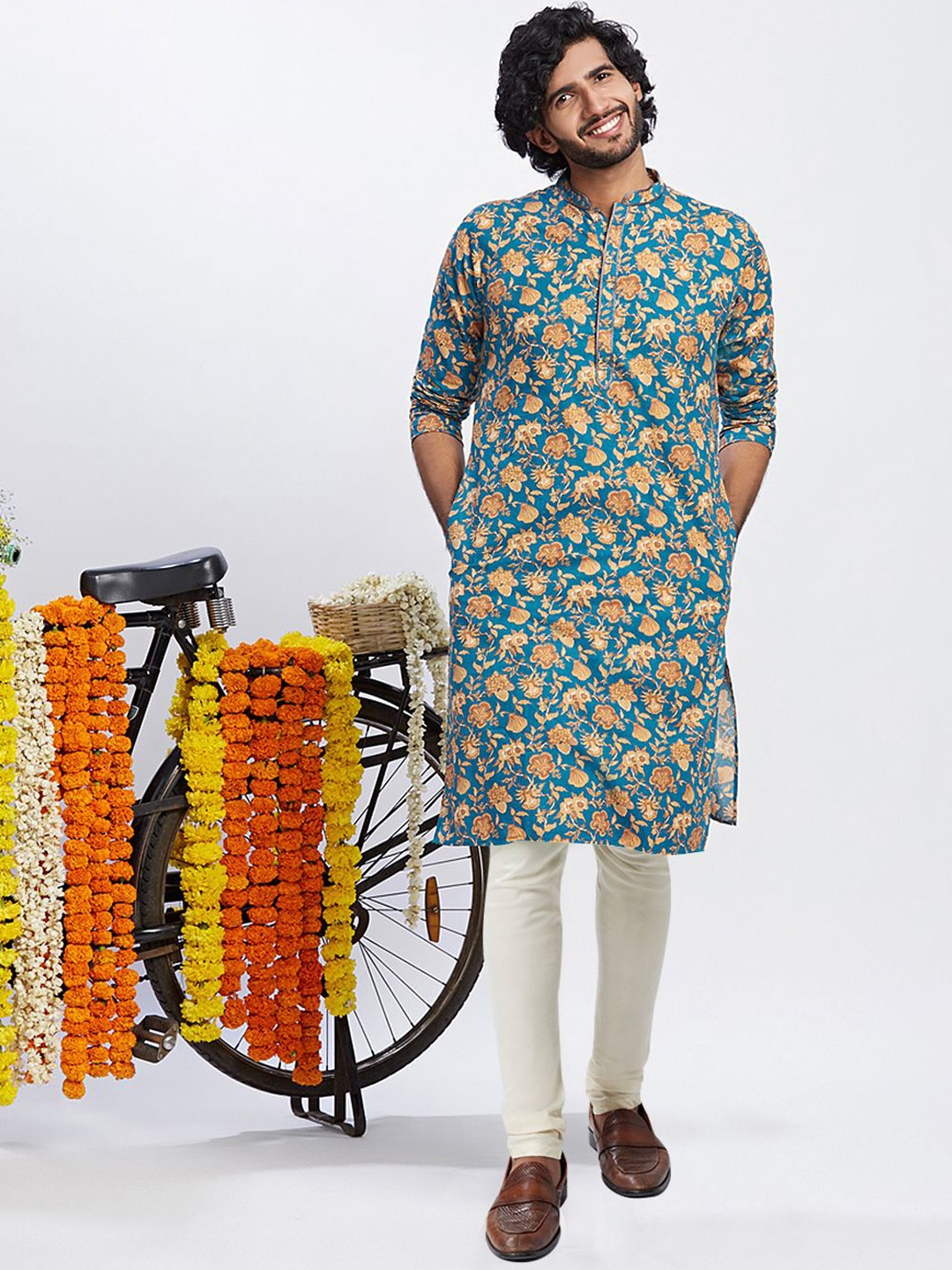

Anouk Blue & White Floral Printed Mandarin Collar Kurta with Churidar