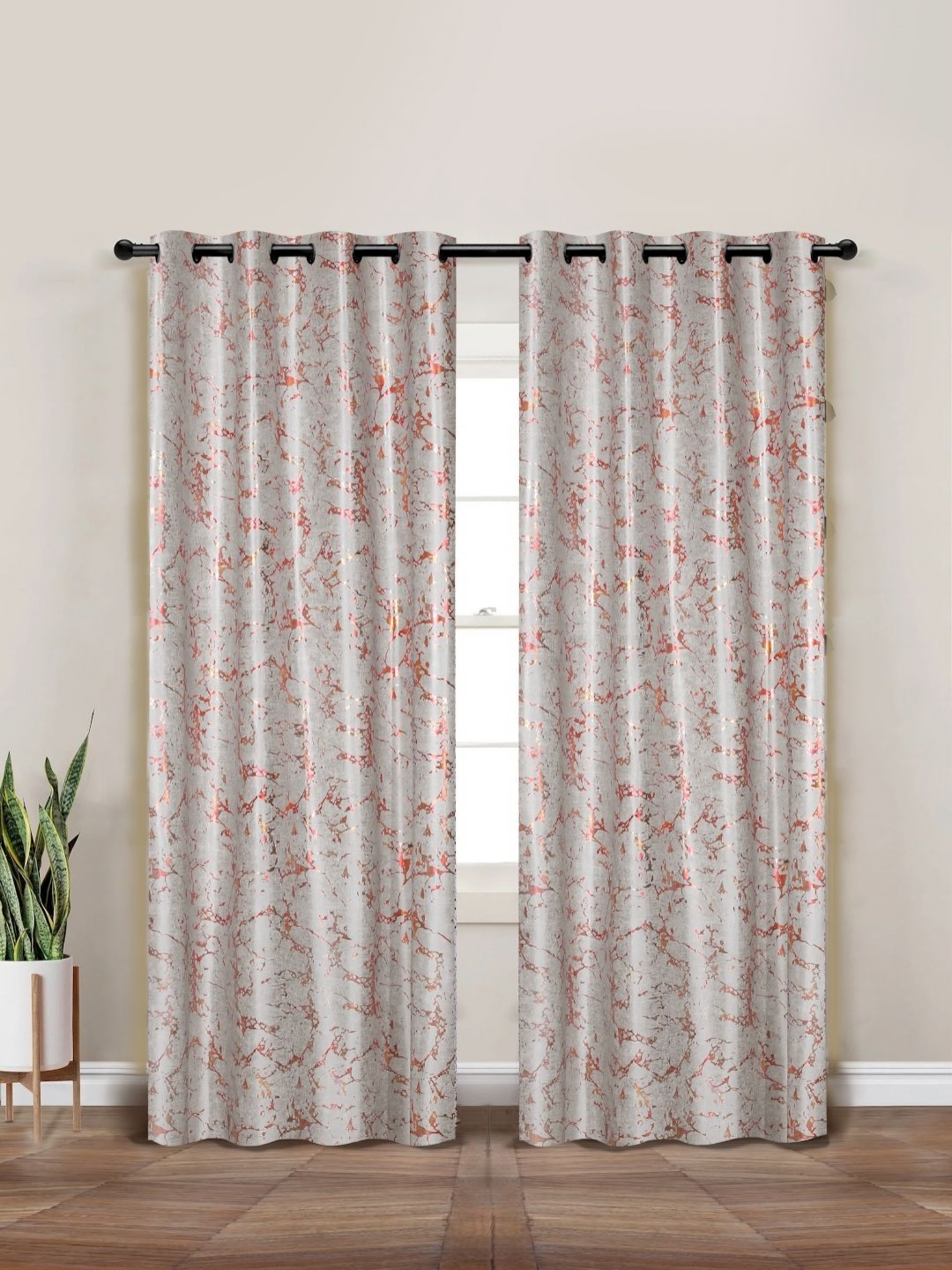 

Myntra Elegant Homes Off White & Orange Set of 2 Black Out Door Curtain