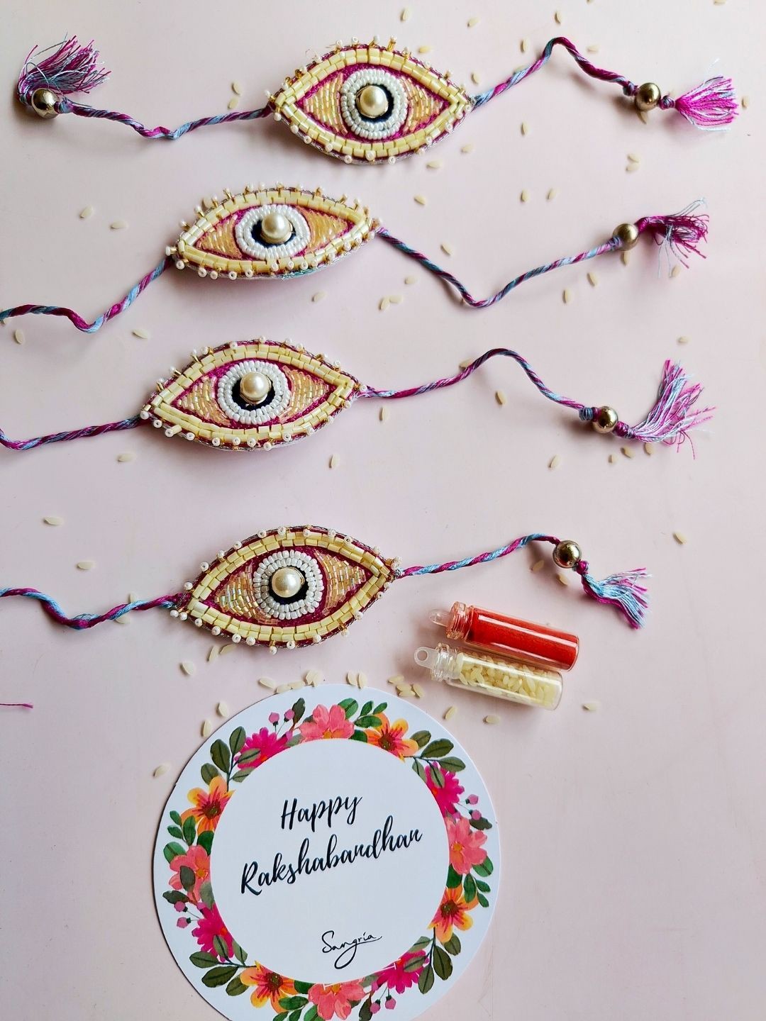 

Sangria Set Of 4 Embellished Thread Rakhi, Multi