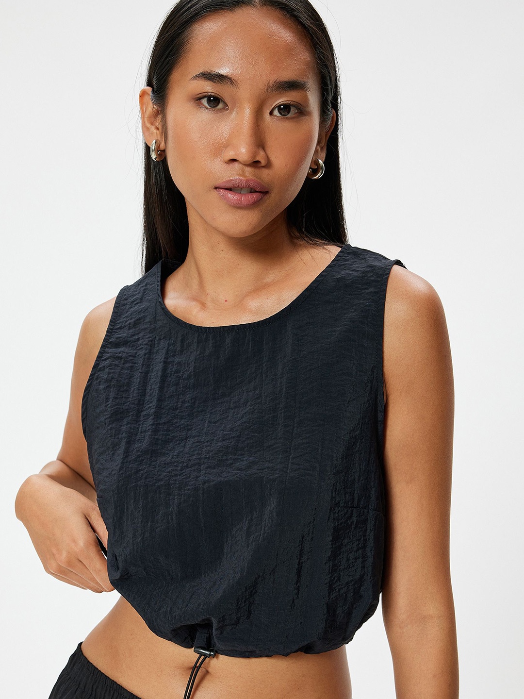 

Koton Women Solid Round Neck Nylon Top, Black