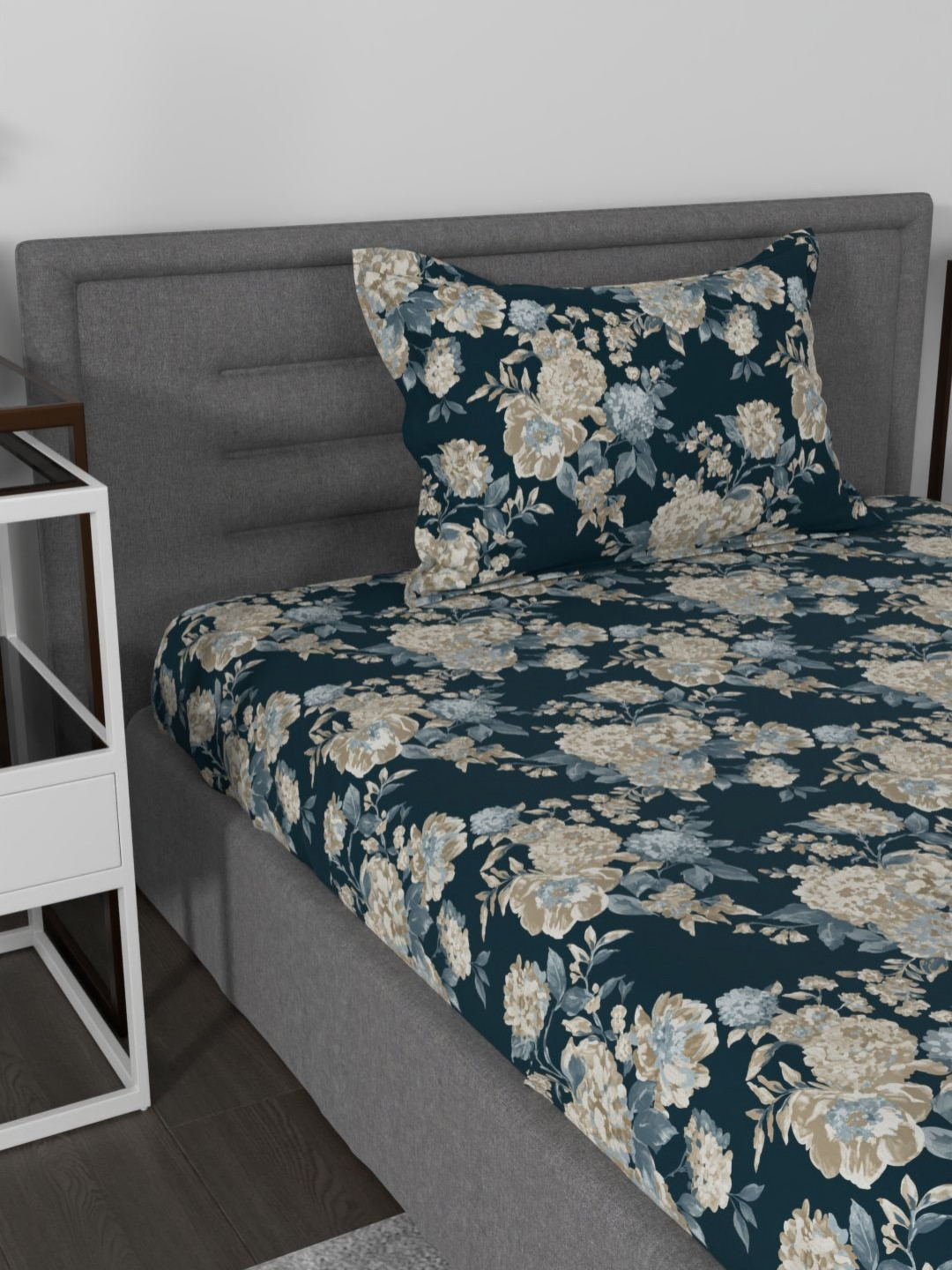 

Myntra Elegant Homes Navy Blue & White Floral 144 TC Single Bedsheet with 1 Pillow Covers