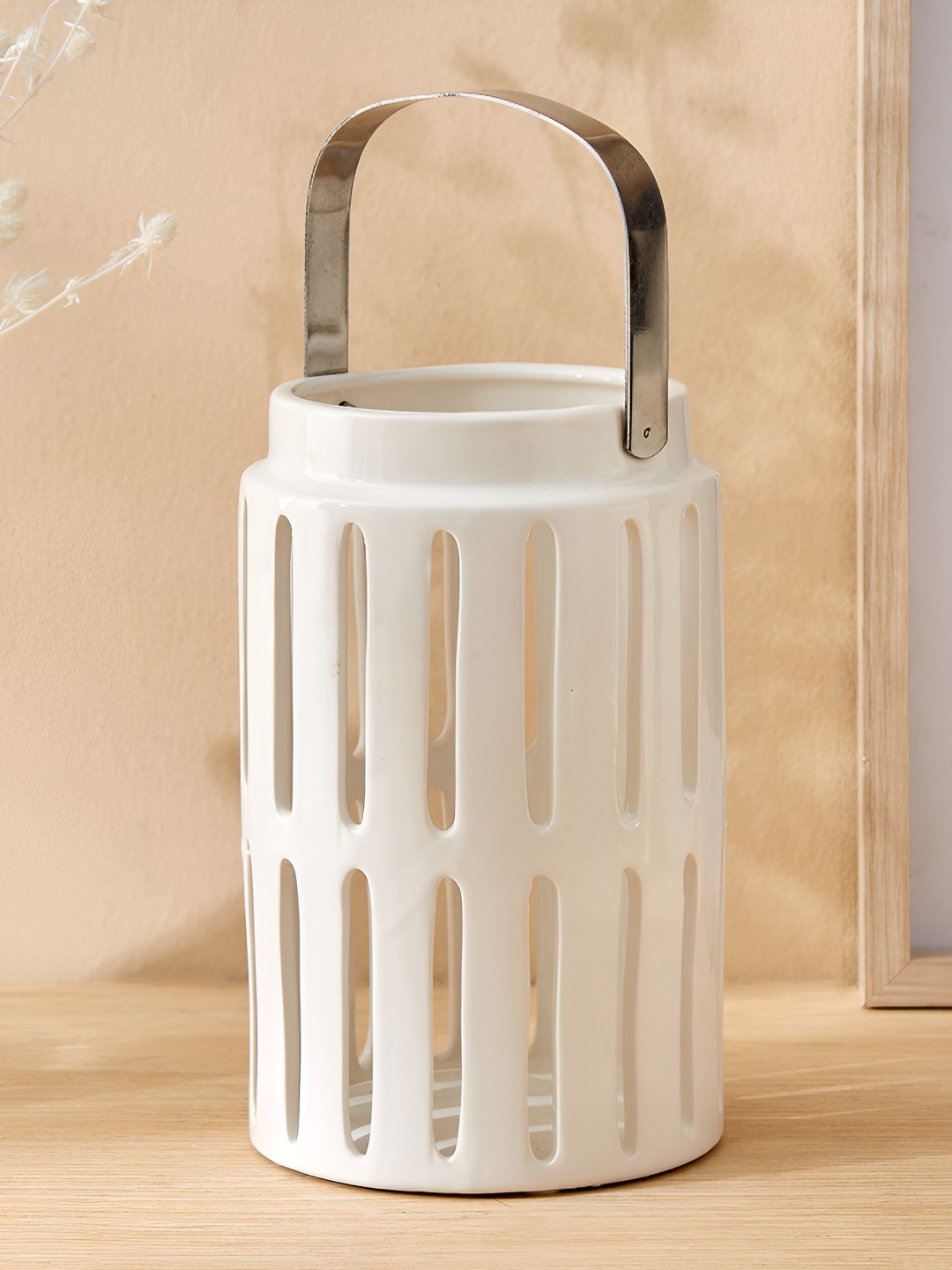 

Home Centre Off White Hanging Lantern Candle Holder