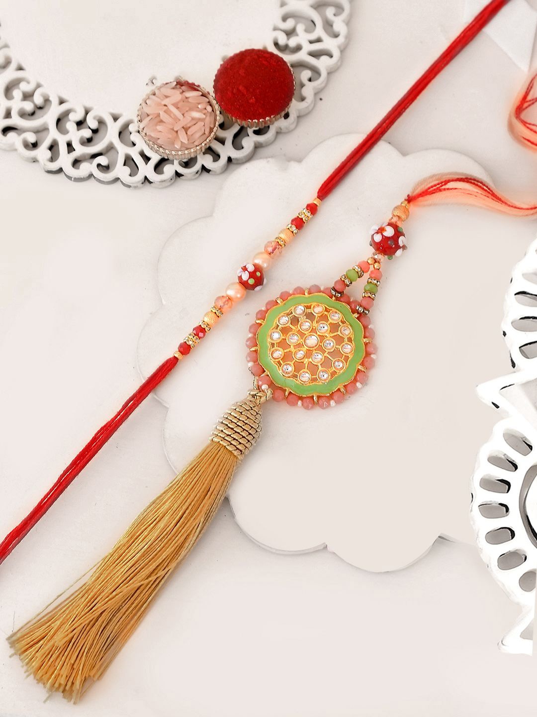 

Aapno Rajasthan Rakhi, Peach