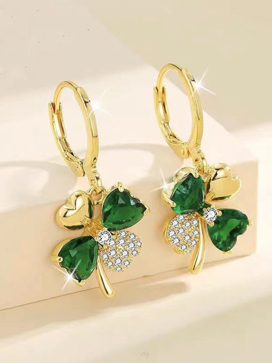 

DressBerry Gold-Plated AD Studded Contemporary Drop Earrings