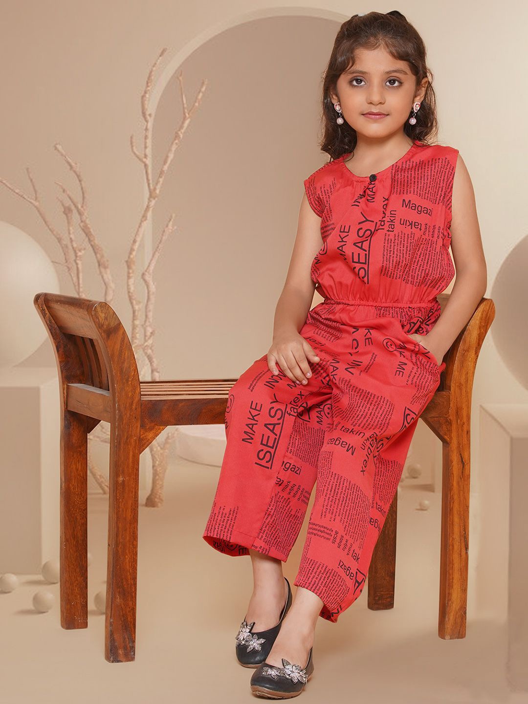 

Arshia Fashions Girls Printed Basic Jumpsuit, Orange