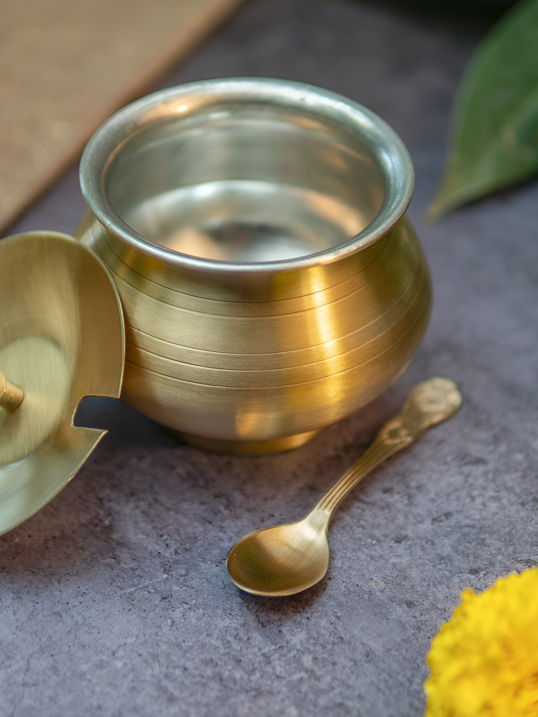 

Ambi Home Gold-Toned Striped Pure Brass Ghee Pot With Spoon 350ml