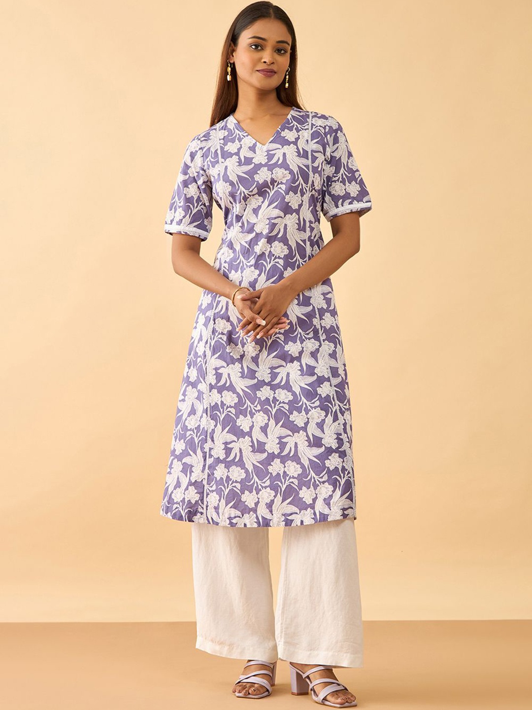 

Taneira Floral Printed V-Neck Regular Pure Cotton A-Line Kurta, Violet