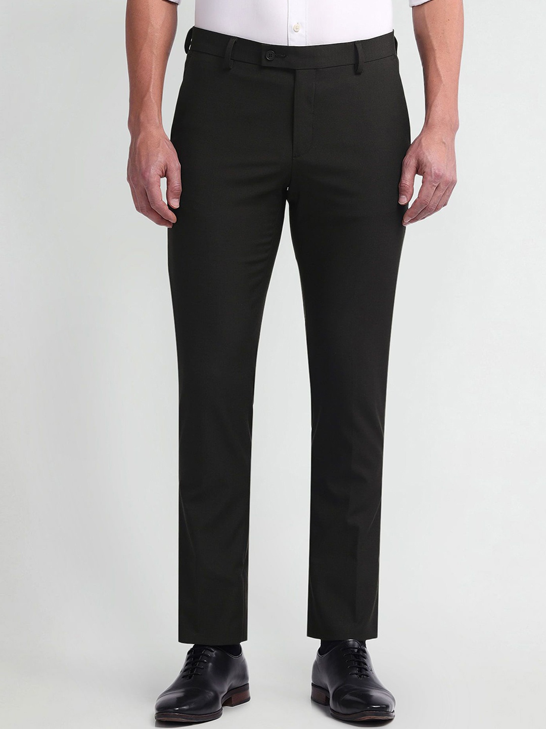 

Arrow Men Solid Slim Fit Trousers, Black