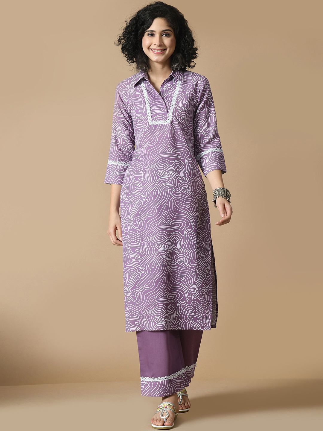 

Sangria Mauve Abstract Printed Shirt Collar Straight Kurta With Palazzos