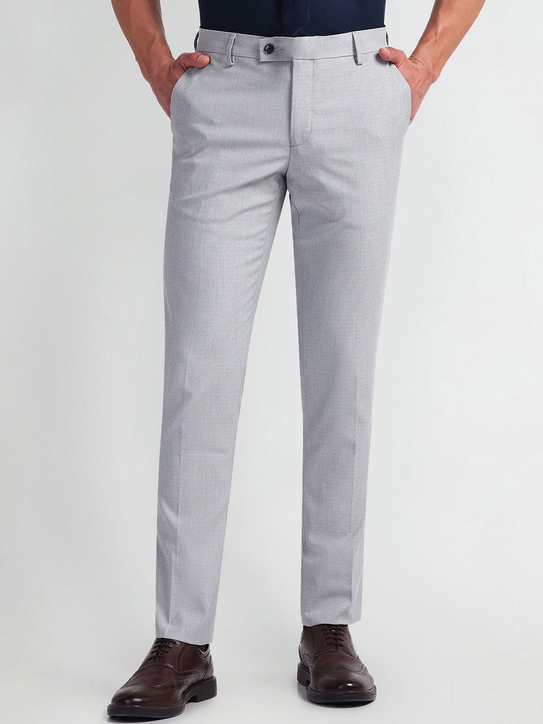 

Arrow Men Solid Slim Fit Trousers, White