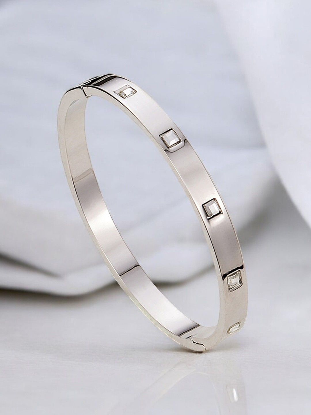 

Designs & You Silver Plated Stainless Steel AD Bangle Style Bracelet