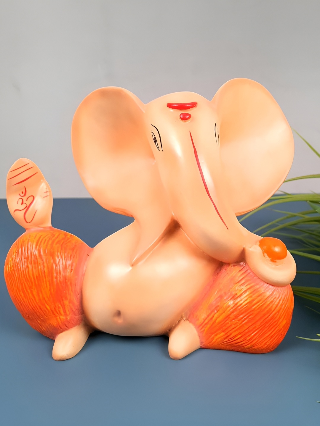 

apka mart Orange Colored & Red Ganesh Idol Showpiece