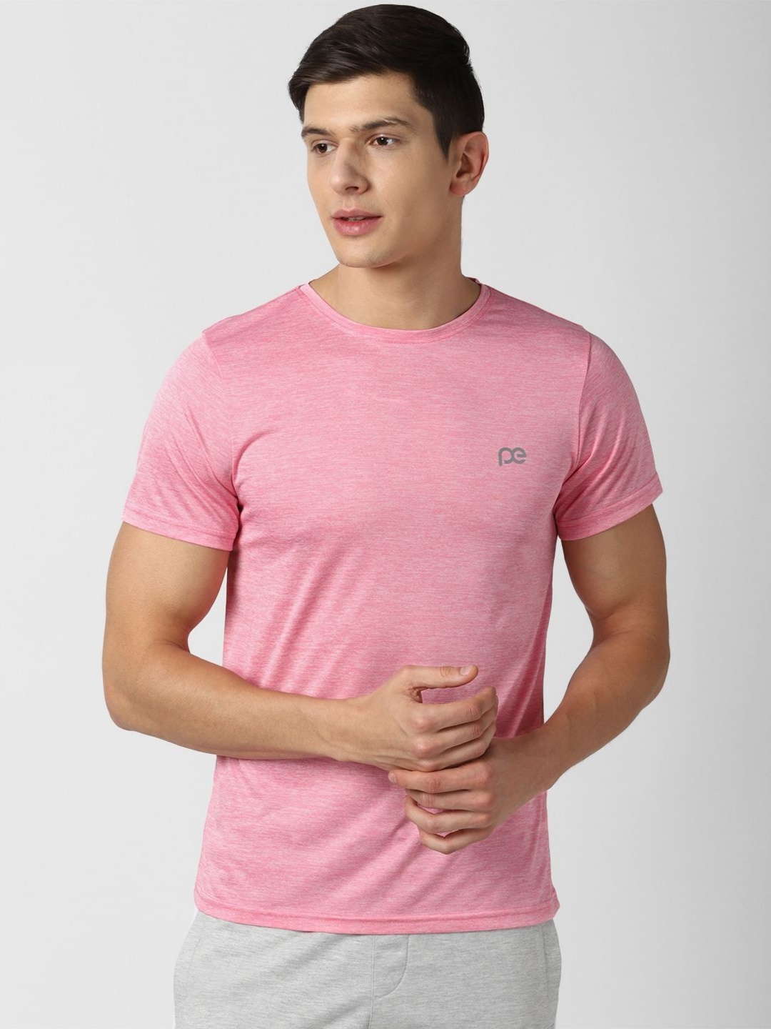 

Peter England Casuals Men Solid Round Neck T-Shirt, Pink