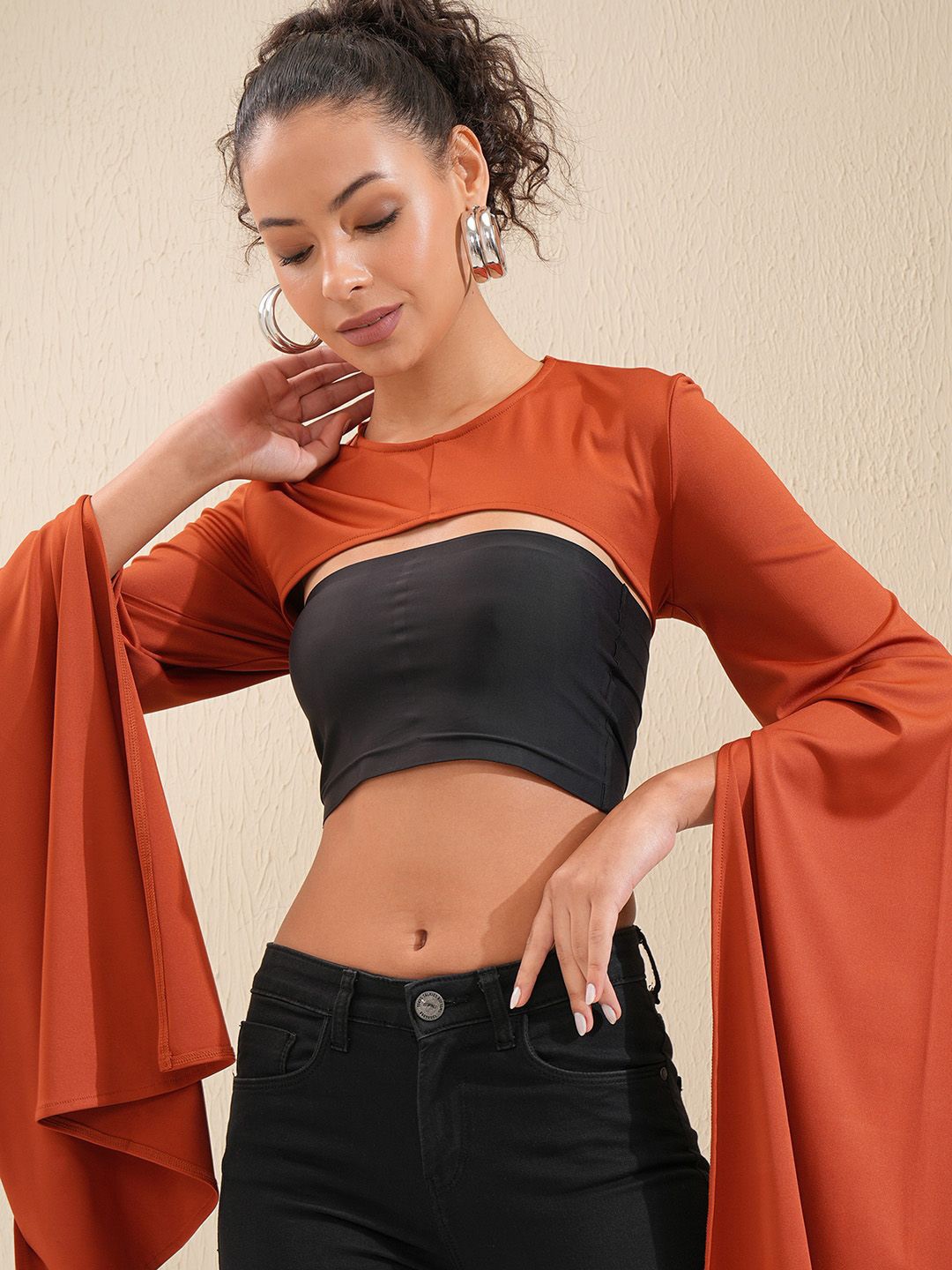 

Tokyo Talkies Women Solid Round Neck Top, Rust