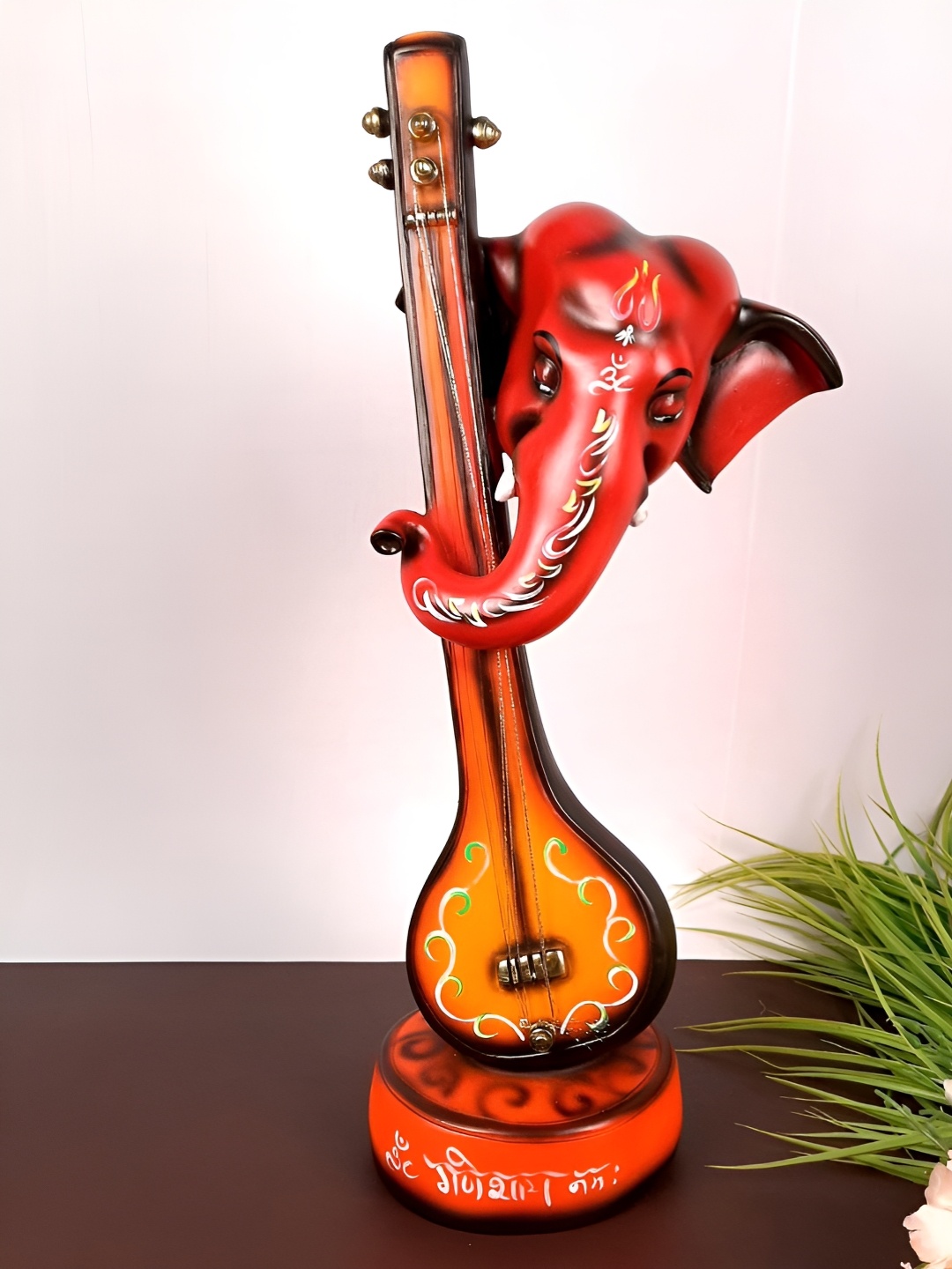 

apka mart Red & Brown Ganesh with Sitar Idol Showpiece
