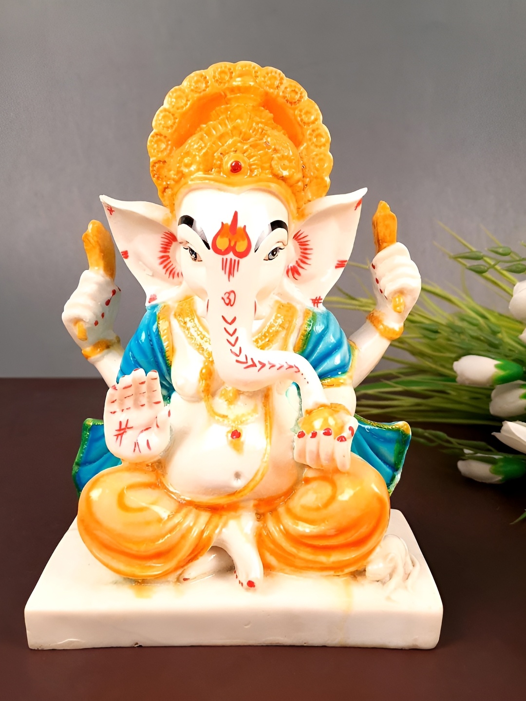 

apka mart White & Orange-Coloured Ganesh Religious Idol Showpiece