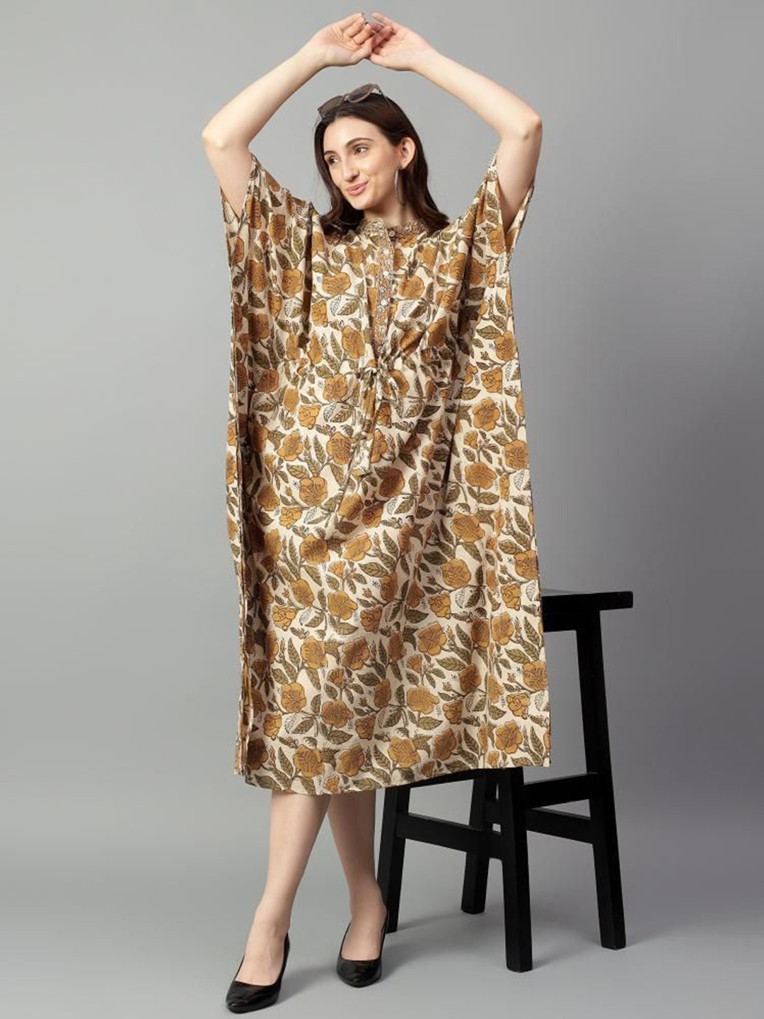 

Safeera Women Ethnic Motifs Printed A-Line Dress, Mustard
