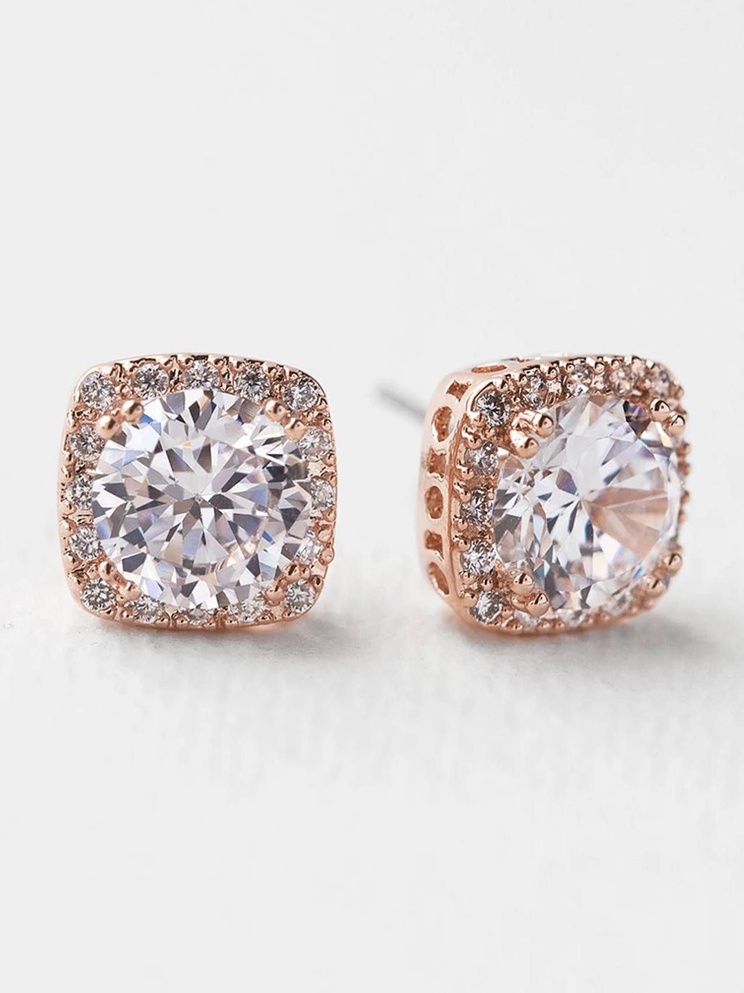 

The Pari Rose Gold-Plated American Diamond Studded Contemporary Studs Earrings