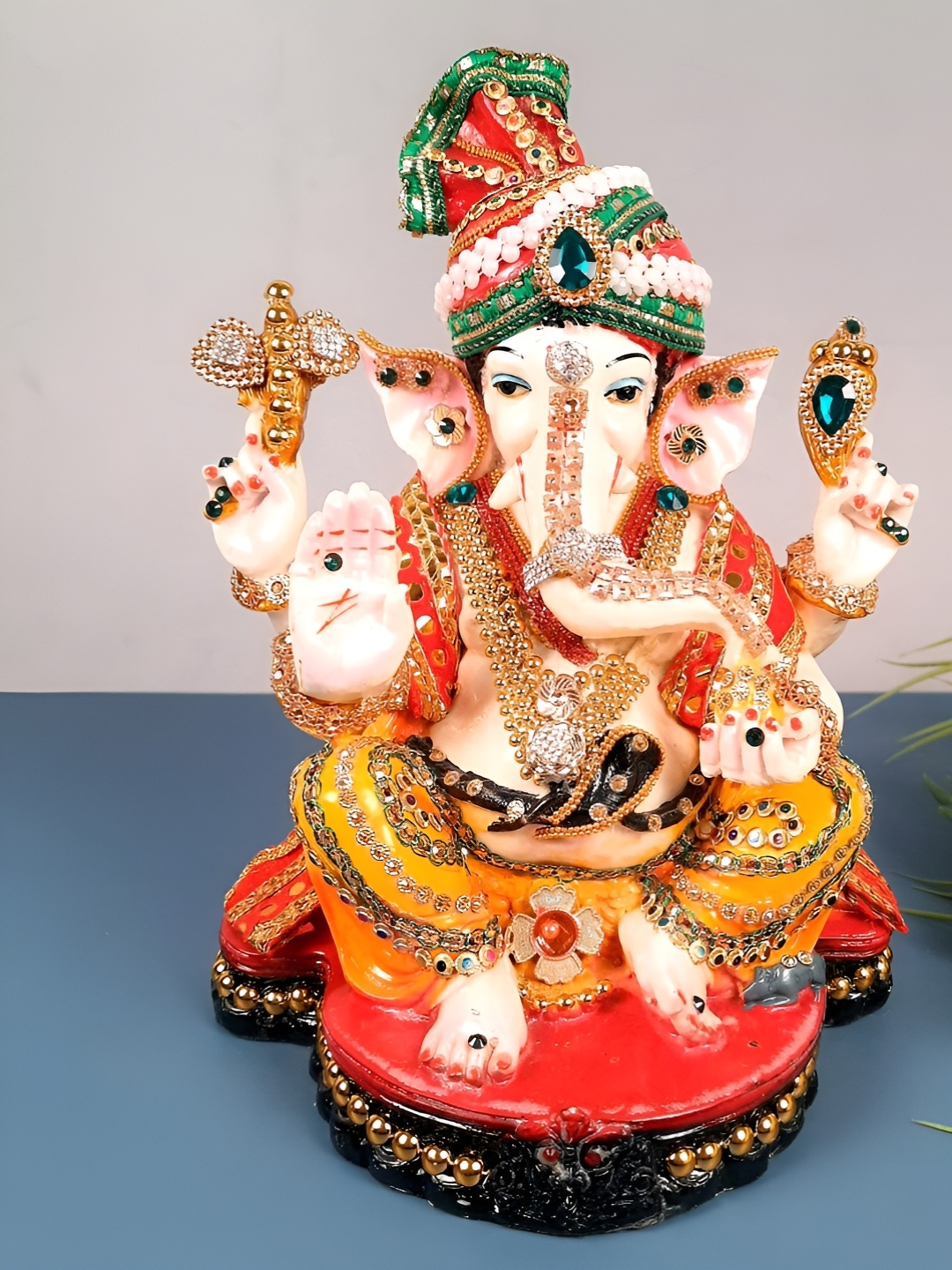 

apka mart White & Orange Colored Beads Work Ganesh Idol Showpiece
