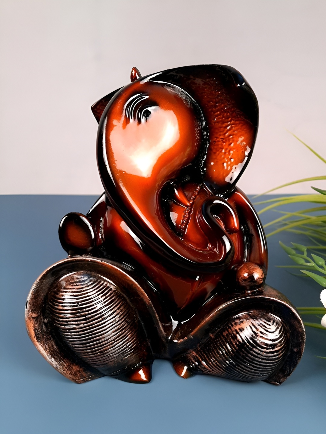 

apka mart Brown & Black Ganesh Idol Showpiece