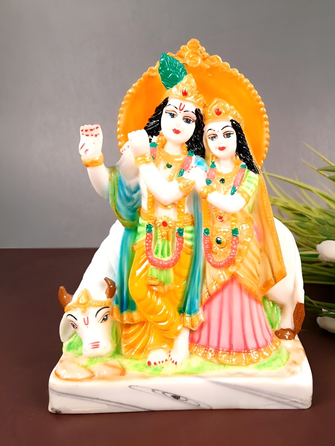 

apka mart White & Orange Colored Radha Krishna Idol Showpiece