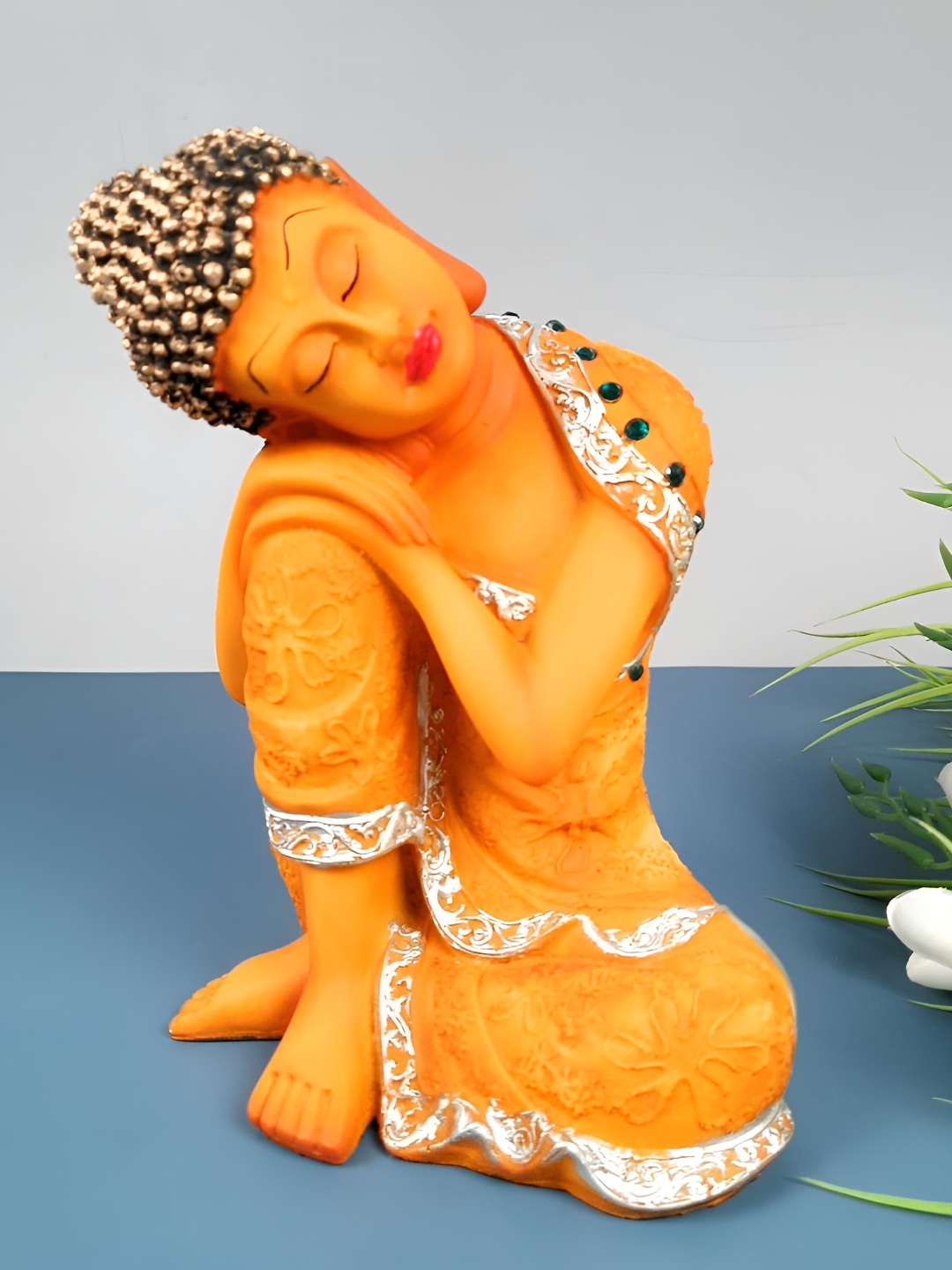 

apka mart Orange Colored & Silver Toned Buddha Figurine Showpiece