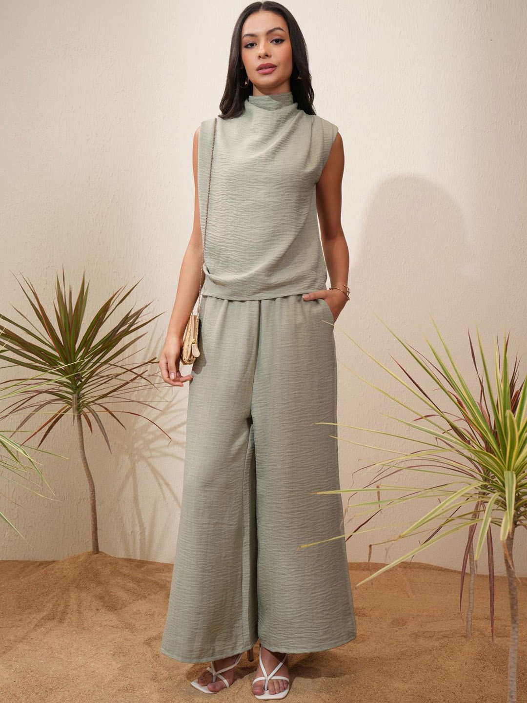 

Vishudh Self Design High Neck Sleeveless Draped Top With Trousers, Sea green