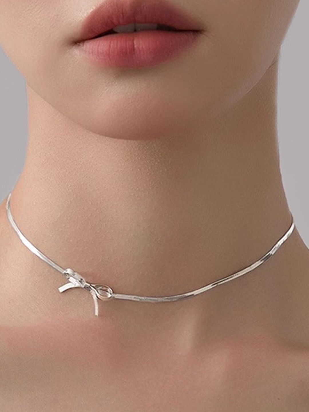 

AQUASTREET Silver Plated Stainless Steel Antitarnish Bow Chain Necklace