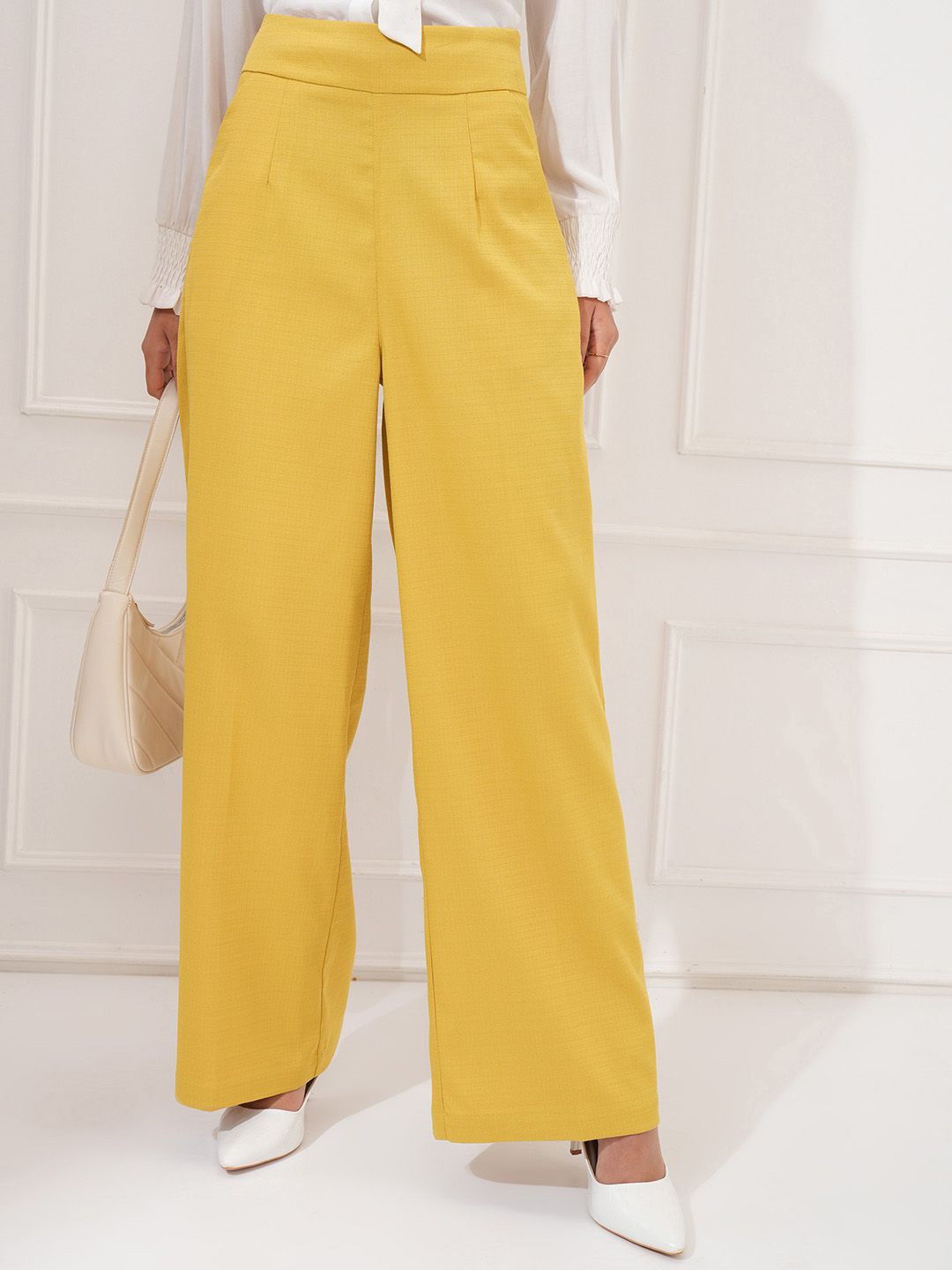 

Tokyo Talkies Women Flared Trousers, Yellow