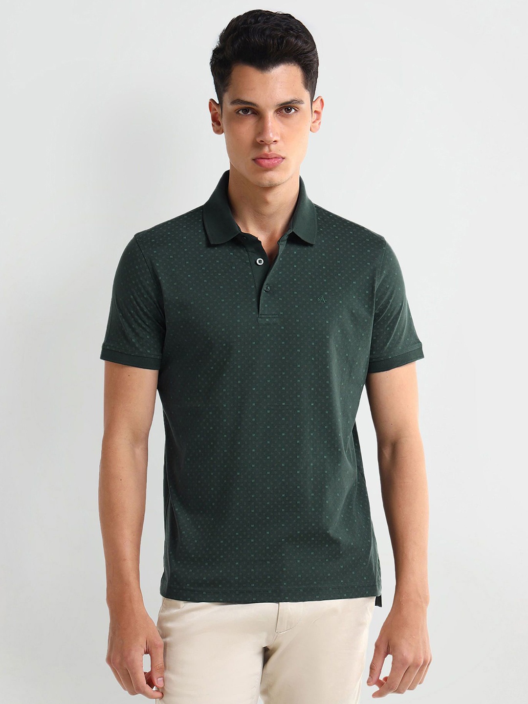 

Arrow Men Abstract Printed Polo Collar Cotton T-shirt, Green