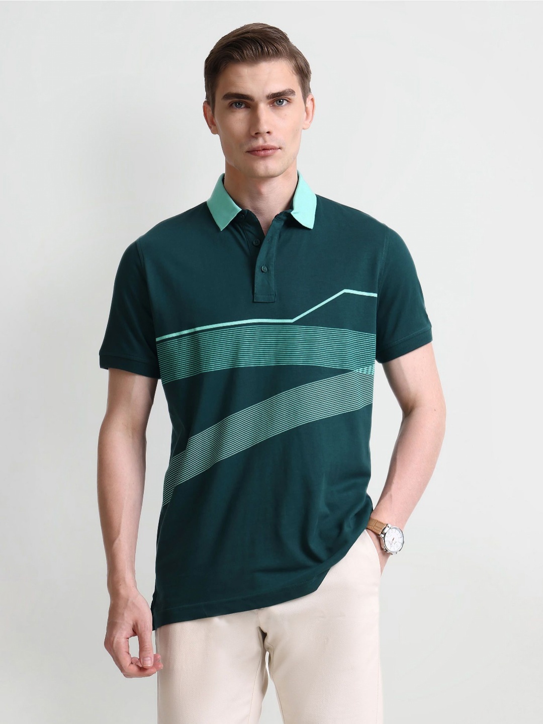 

Arrow Men Abstract Printed Polo Collar Cotton T-shirt, Green