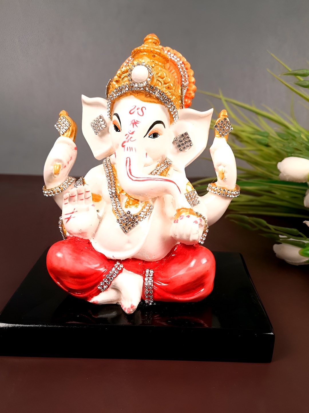 

apka mart White & Orange Colored Ganesh Idol Showpiece