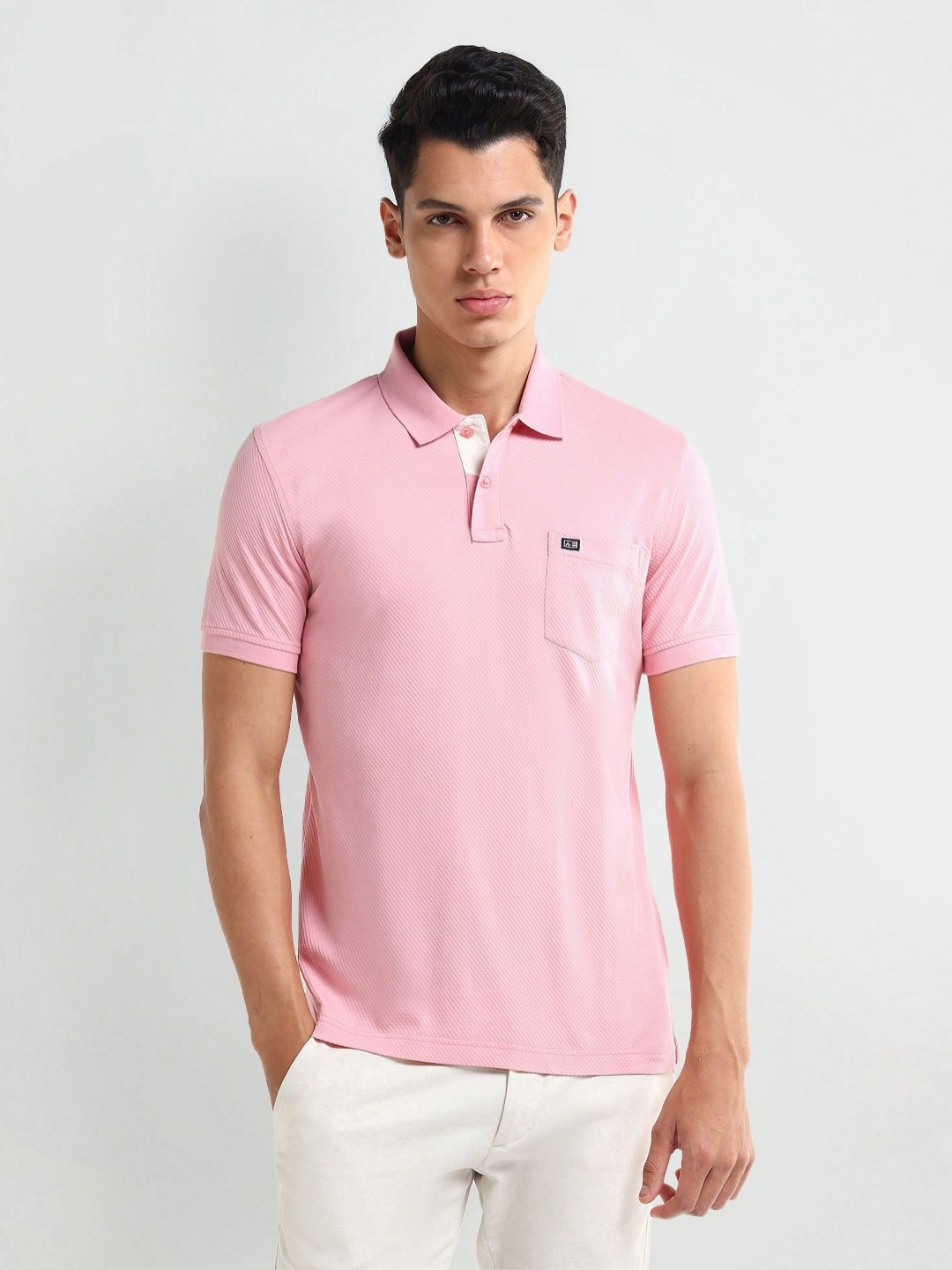 

Arrow Men Self Design Polo Collar Cotton T-shirt, Pink
