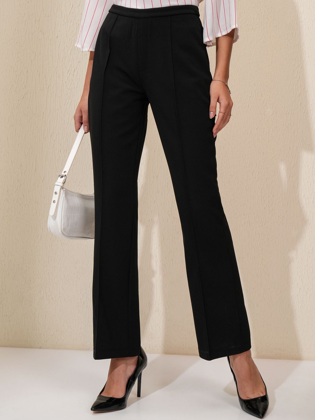 

Tokyo Talkies Women Flared Trousers, Black