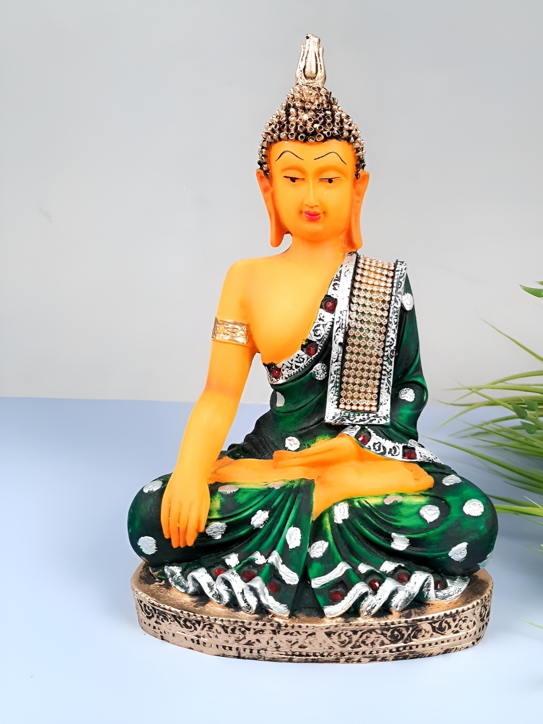 

apka mart Green & Orange Coloured Lord Buddha Idol Showpiece